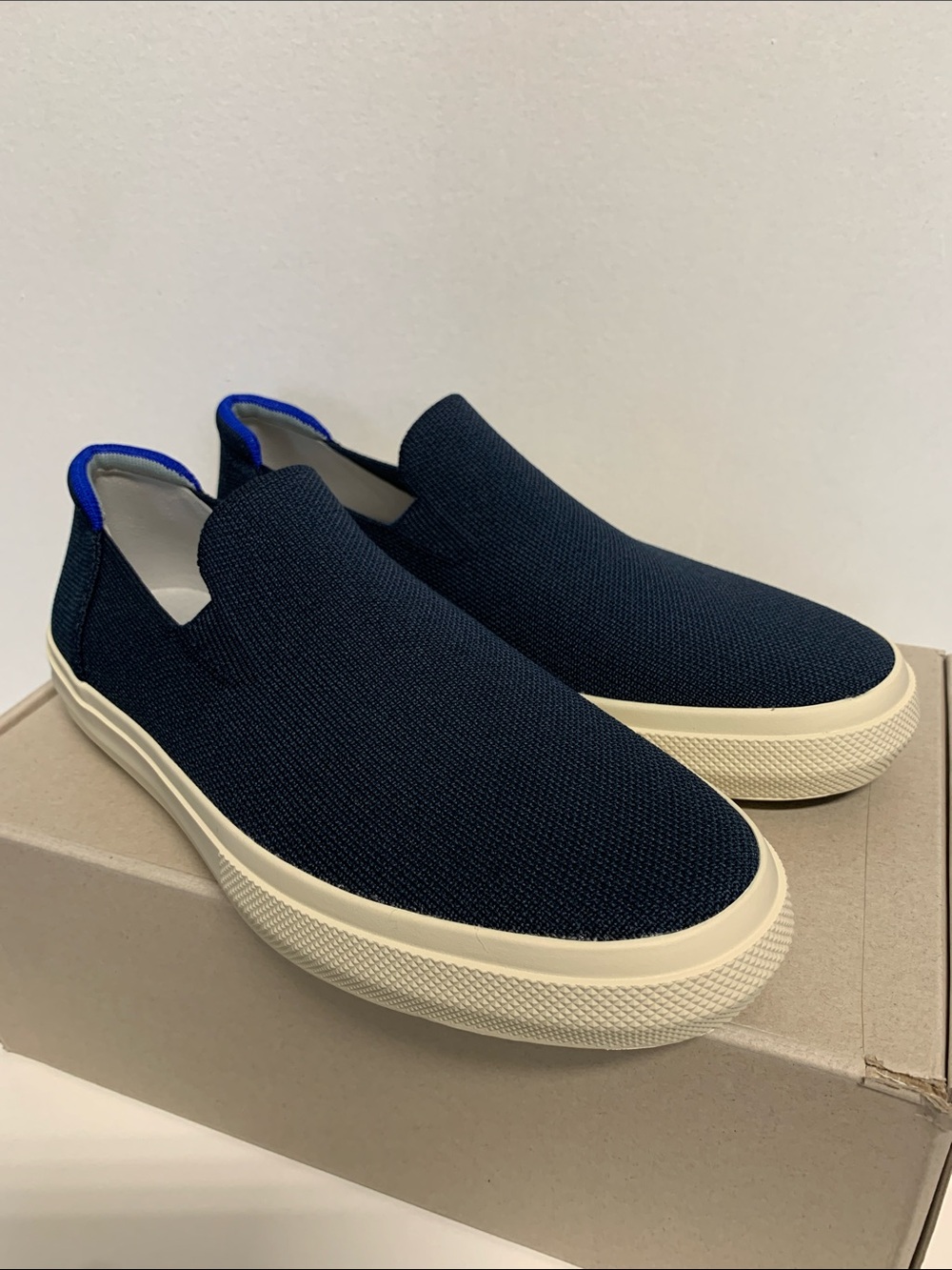 Rothy's Navy Knit Slip-On Sneakers with Cream Sole and Blue Heel Tab